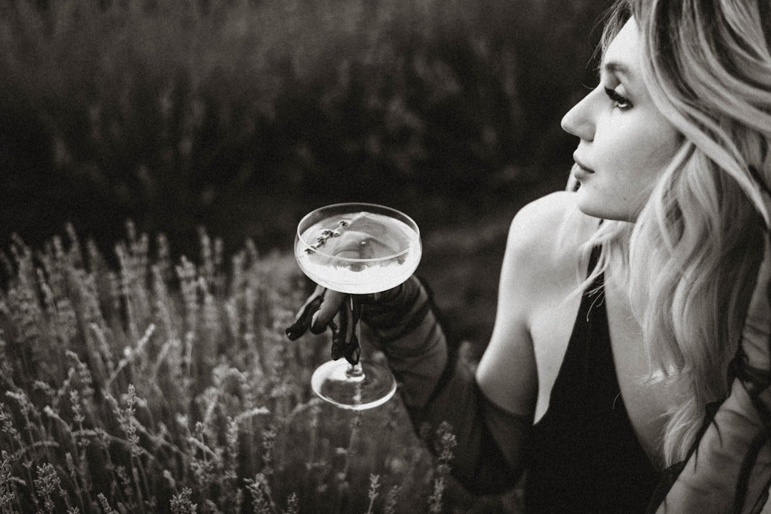Elegant perfume bottles arranged artistically on a marble surface with soft lighting