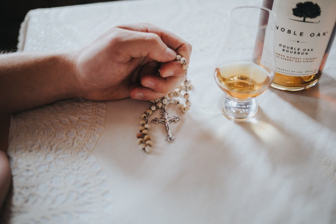 Featured perfume collection display with elegant glass bottles and golden accents